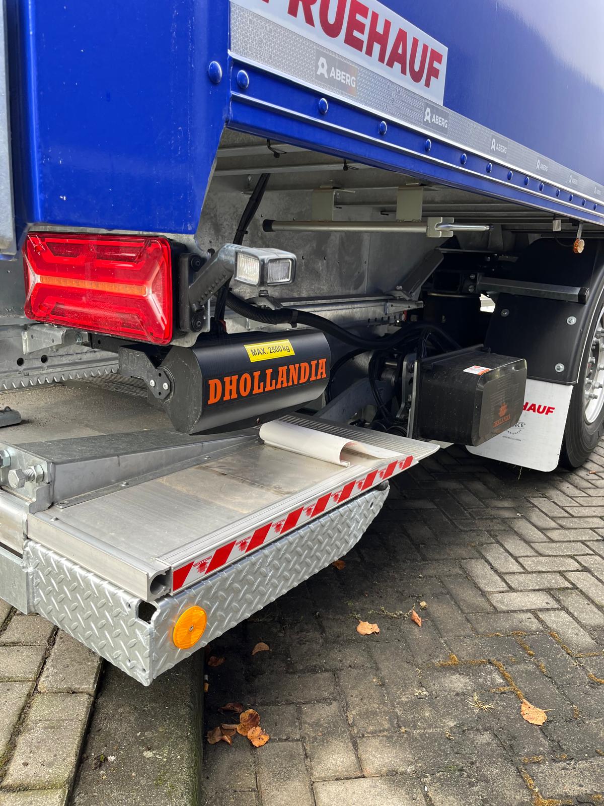 dhollandia laadklep ondersluitend ondersluiter onderschuiver fruehauf plywood