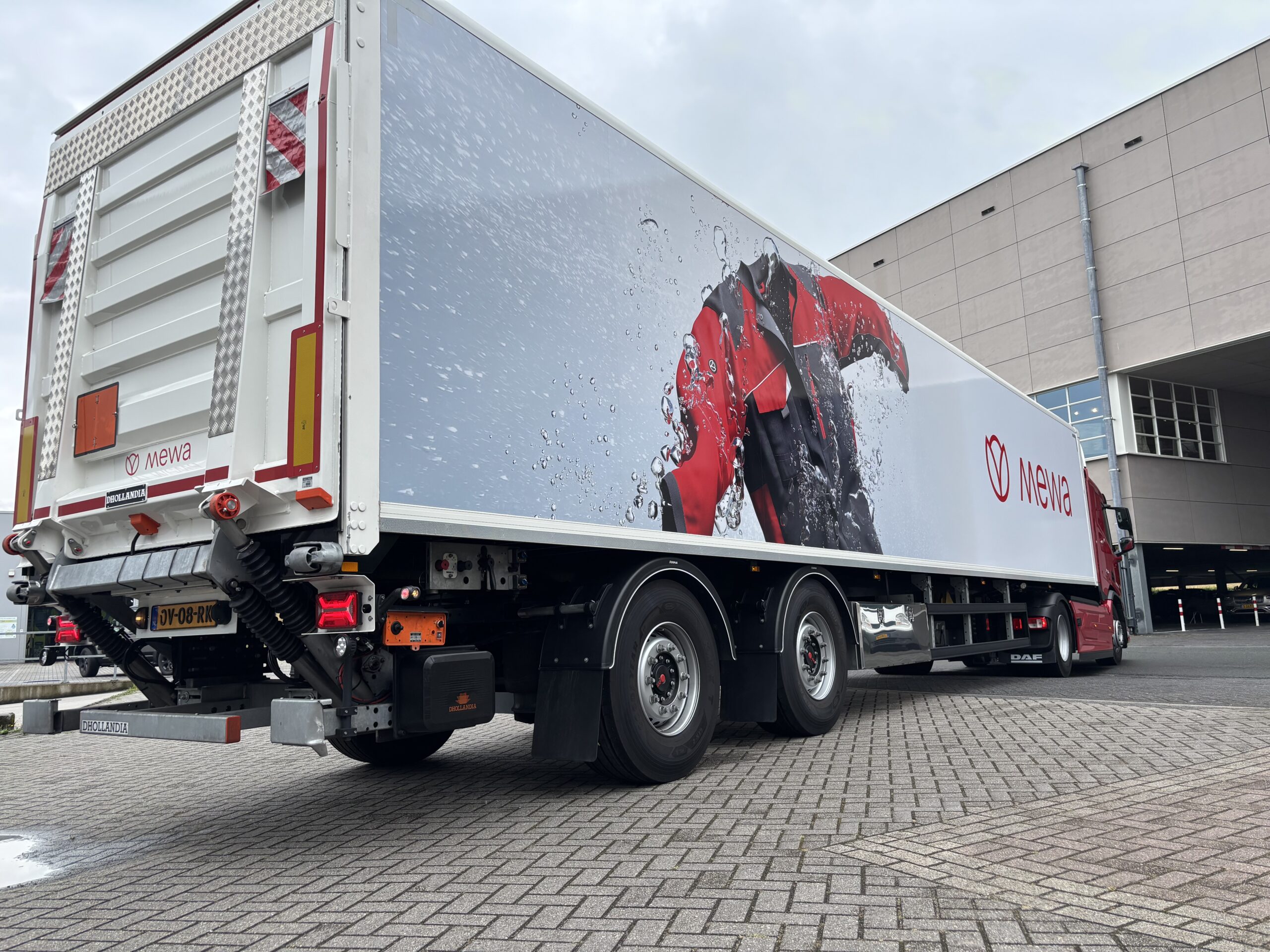MEWA Textiel Gestuurde oplegger stuurtrailer plywoodoplegger